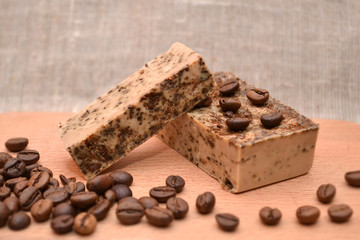 Handmade coffee natural soap on wooden background