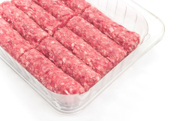 Raw kebab minced meat in plastic bowl on white