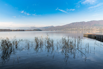 Lake Varese from Cazzago Brabbia, province of Varese, Italy. In the background from left to right: islet Virginia, Biandronno, Gavirate, Campo dei fiori of Varese 