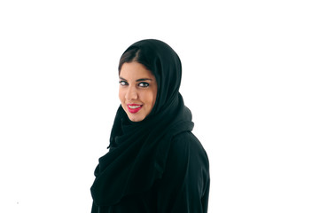 Attractive Arabian Woman Wearing Hijab standing over a white background