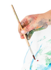 depicting children's hands in the paint with a brush