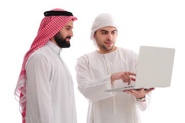 Two Arabian Businessmen holding a notebook discussing work over a white background, business concept
