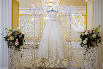 bride's wedding white dress in interior
