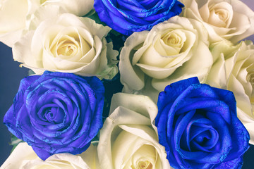 bouquet of white and blue roses