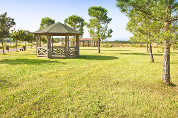 Covered wooden gazebos in a italian countyside (Tuscany - Italy)