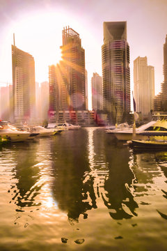 Luxury Dubai Marina against sunset in Dubai, United Arab Emirates.