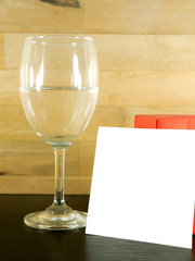 handmade mini gift boxes over vintage wooden background with with white card for copy text .white card is clipping path