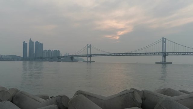 Busan city skyline Gwangan bridge sunrise timelapse, Busan, South Korea, 4K Time lapse
