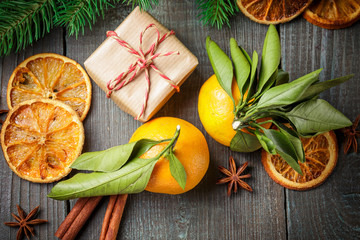Christmas decoration with gift box and mandarines
