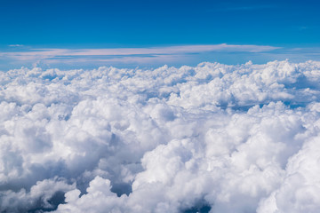 Naklejka na ściany i meble Cloud and blue sky from the window of airplane 