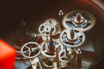 Close view of old clock mechanism with gears and cogs. Conceptual photo for your successful...