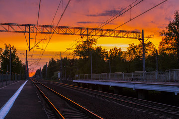 Fototapeta na wymiar Railway at sunset