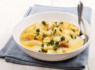 cooked cullen skink with parsley in a deep plate