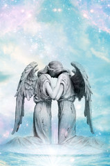 two angels with rays of light