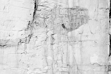 Wall fragment with scratches and cracks