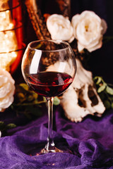 Glass of wine on vintage background