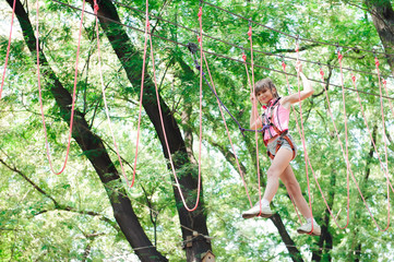 adventure climbing high wire park - hiking in the rope park girl