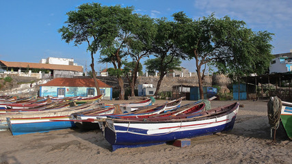 Fototapeta na wymiar colorful fishing boats on a beach in Tarrafal in Cape Verde