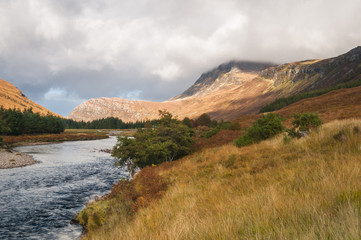 A landscape image looking at Ben Hope along the Strathmore river, Sutherland, Scotland.