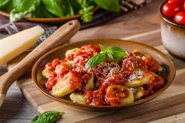 Roasted gnocchi with tomato souce