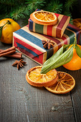Christmas decoration with gift box and mandarines