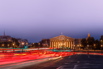 The Bourbon Palace is the place where National Assembly meets. It located on the left bank of the Seine, across from the Place de la Concorde. Paris cityscape night view.