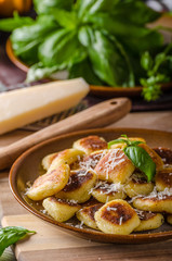 Crispy gnocchi with cheese and herbs
