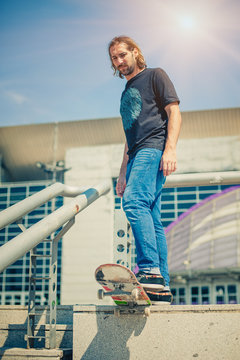 Skater standing next to the rails