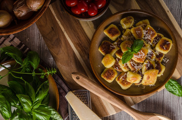 Crispy gnocchi with cheese and herbs
