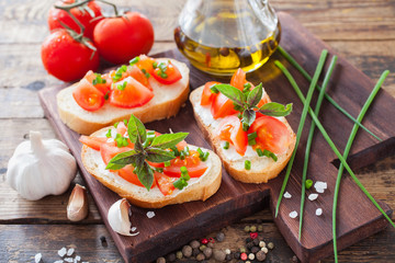 sandwiches with tomatoes on a board, selective focus