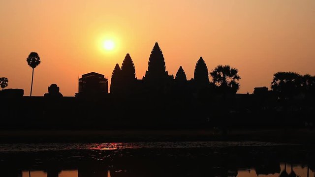 Cambodia Angkor Wat sunrise with mirror image reflection