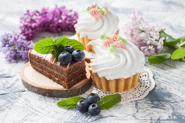 cream cakes on a table, selective focus