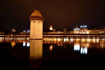 Fototapeta na wymiar Night view of Chapel Bridge in Lucerne