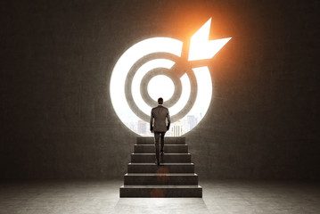 Man climbing to a target