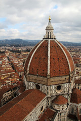 Fototapeta na wymiar View of the cupola of Il Duomo Cathedral from Campanile tower, Florence