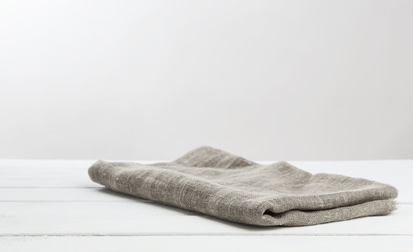 Burlap Tablecloth On Wooden White Wooden Table