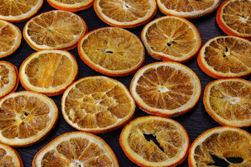 background of slices of dried orange
