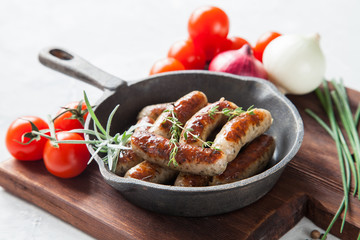 sausages and vegetables on a table, selective focus