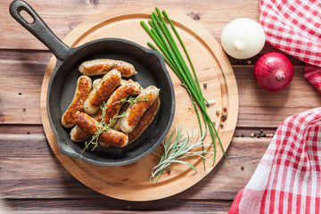 sausages and vegetables on a table, selective focus