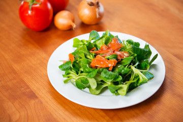 field salad with carrot, tomato and onion