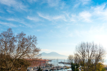 Fototapeta na wymiar Street view of Naples harbor with boats, italy Europe