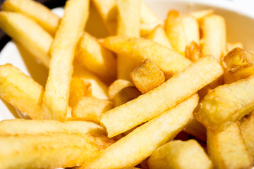Golden French fries potatoes ready to be eaten