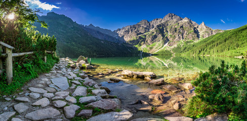 Beautiful lake in the mountains at dawn in summer