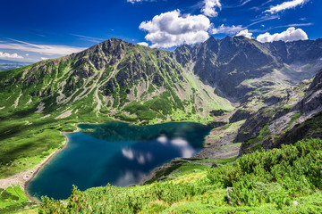 Beautiful sunrise at Czarny Staw Gasienicowy in Polish Mountains - obrazy, fototapety, plakaty