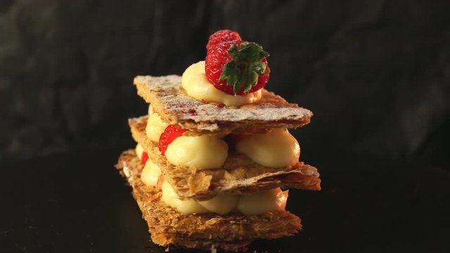 Millefeuille dessert with strawberries dessert sweet on black background cake