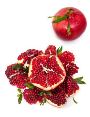 Pomegranates fruit with cut open on white background