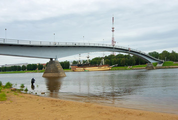 Fototapeta premium The City Of Veliky Novgorod. Pedestrian bridge (Humpback) over the Volkhov river
