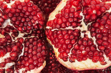 Pomegranates fruit with cut open on white background