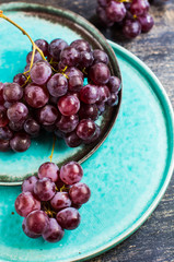 Organic grape on rustic background