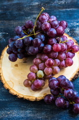 Organic grape on rustic background